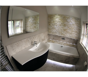 We created a feature wall using quartz decopanel - the furniture is by Svedbergs.