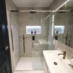 3. Edge to edge shower with Laufen Marbond shower tray.