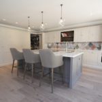 4. Discreet pendant lighting from Fritz Fryer. The doors to the walk in pantry are open in the background.