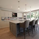 6. The main cabinetry is painted in Farrow & Ball ‘Skimming Stone’, whilst the island is painted in ‘Charleston Gray’.