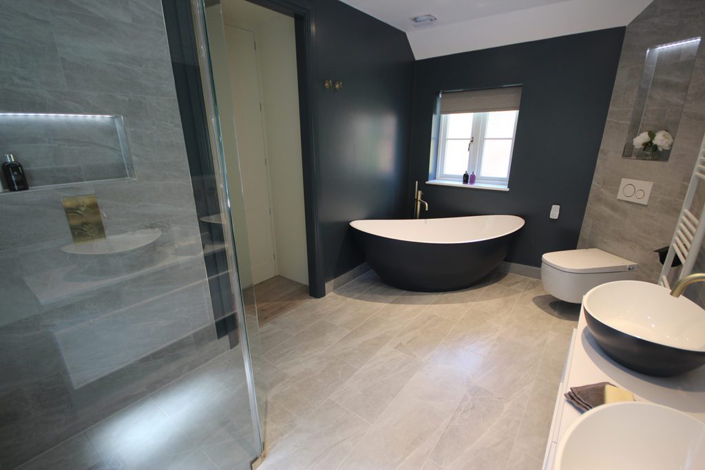 10. This master en-suite has it all. Breeze bath from Waters Baths of Ashbourne, painted in Farrow & Ball Hague Blue.