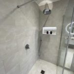 12. A spacious walk in shower.