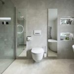 Two bespoke recessed mirror cabinet for additional storage.