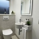 2. Laufen Val small washbasin with built in towel holder.