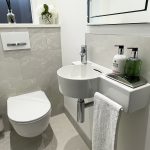 3. Laufen Pro rimless wall hung WC with Geberit concealed frame and cistern.
