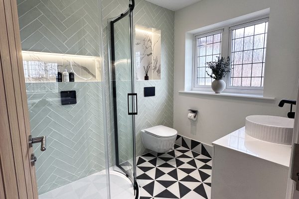 Matt black bathroom with Sage herringbone tiles (10)